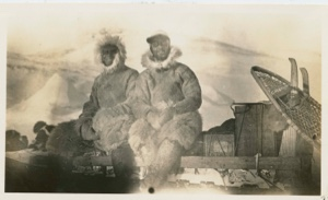 Image: MacMillan and Borup sitting on sledge